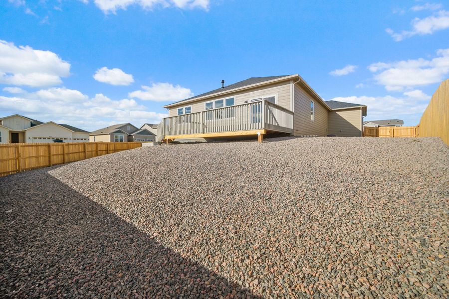 Exterior details and patio area of a home in The Glen, Colorado Springs (Image 4). Exterior details and patio area of a home in The Glen, Colorado Springs (Image 4).