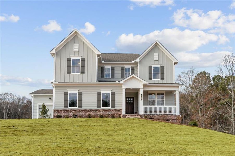 Front exterior of a new home in Prescott Manor, Canton, GA, highlighting curb appeal (Image 1).