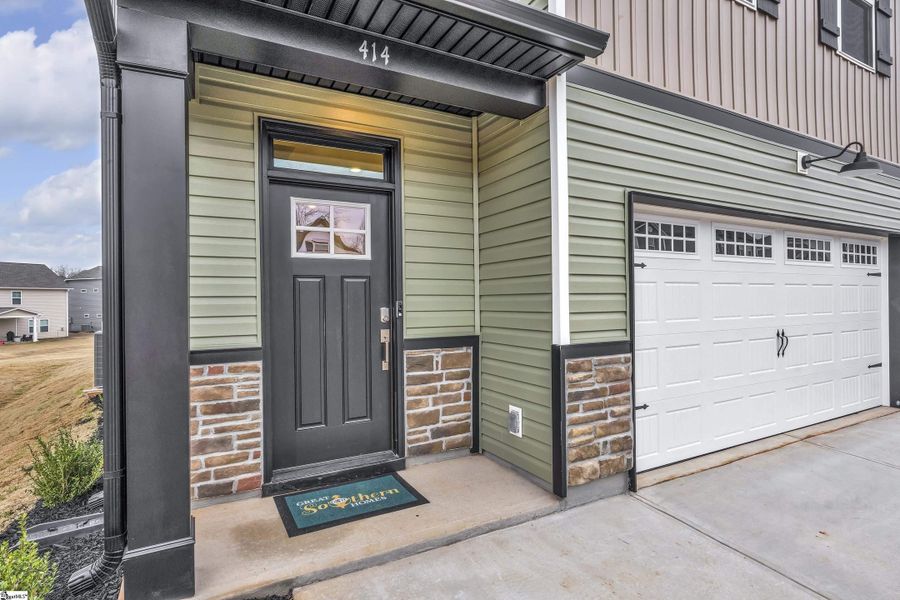 Exterior details and patio area of a home in Sedona, Greenville (Image 2).