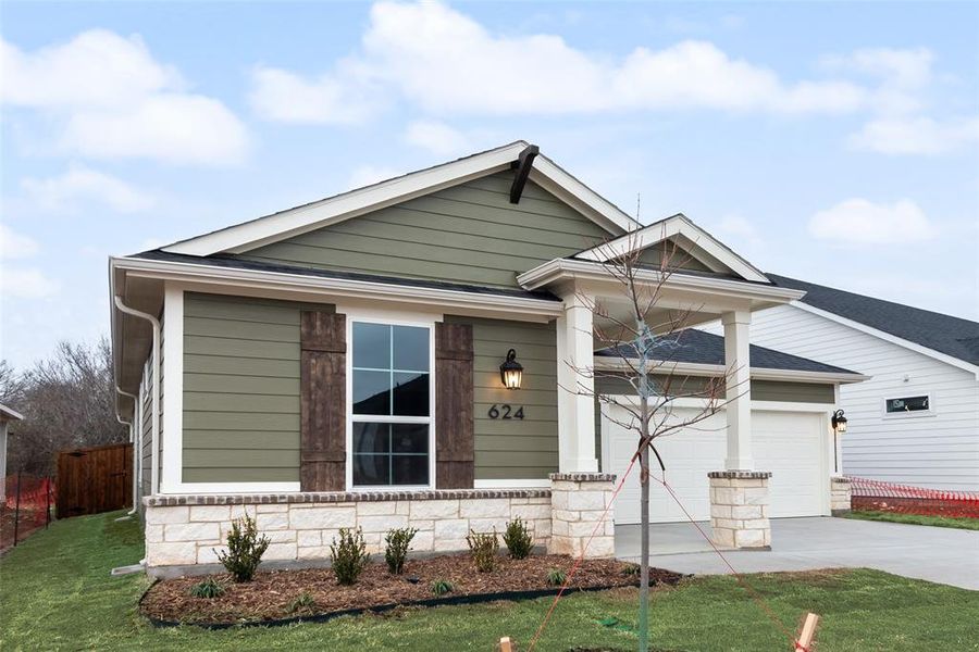 Exterior details and patio area of a home in Creekside of Crowley, Crowley (Image 4).