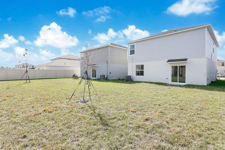 Exterior details and patio area of a home in Peace Creek Reserve, Winter Haven (Image 3).