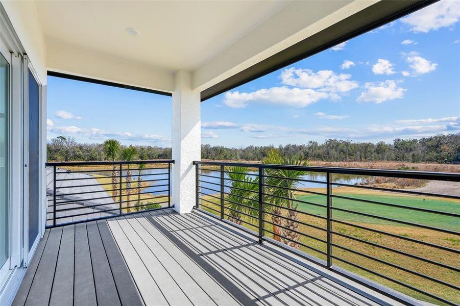 Exterior details and patio area of a home in Hampton Green at Providence, Davenport (Image 4).