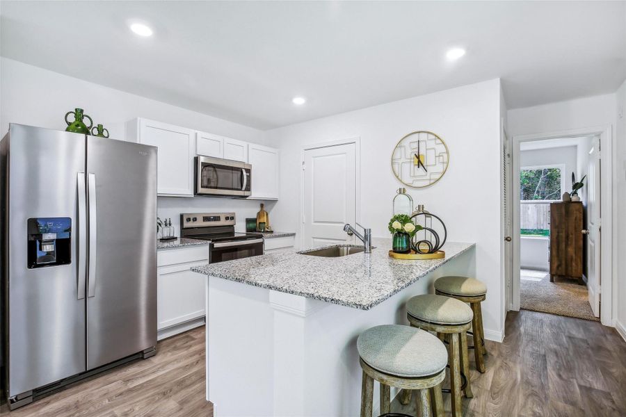 Furnished interior in a model home at William Trails in Willis (Image 16).