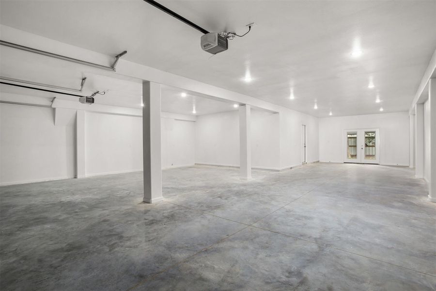 A second view of the garage with french doors to the backyard
