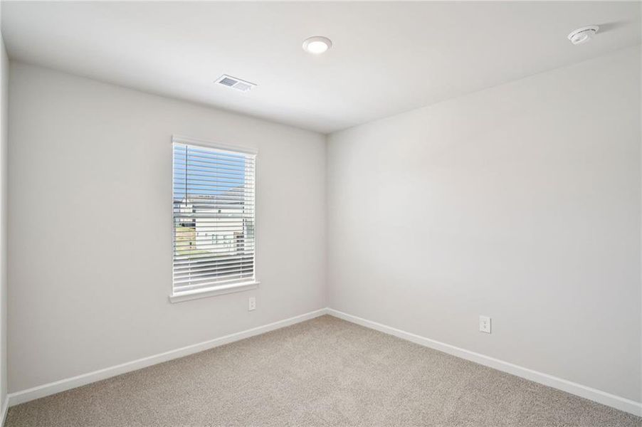 Spacious, unfurnished interior of a new home in Hawthorne Station, College Park (Image 21).