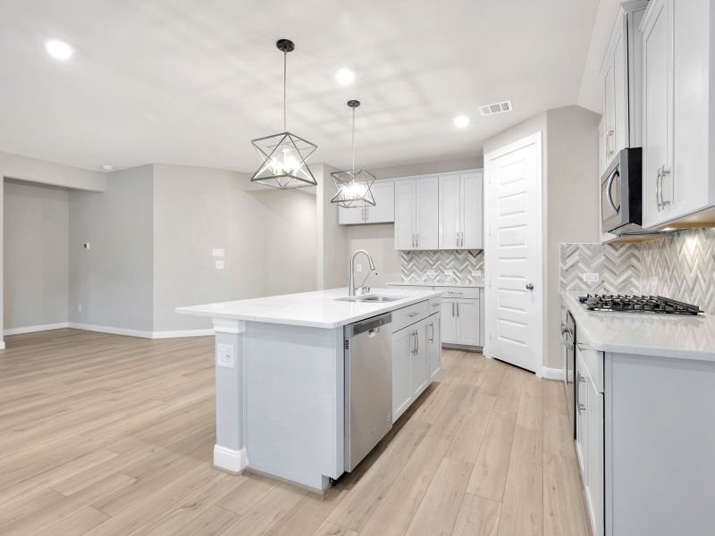 Furnished interior view inside a new home in Pine Lake Cove - Classic Series, Montgomery (Image 10).