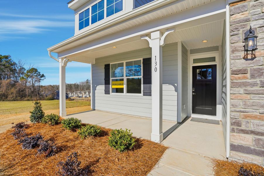 Exterior details and patio area of a home in Villas at Prestwick, Mooresville (Image 4).