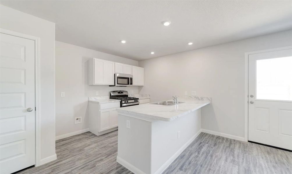 Furnished interior view inside a new home in Stoney Ridge, Hudson (Image 4).