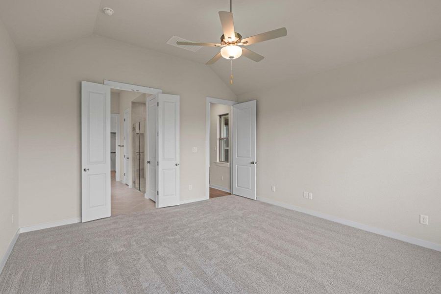Primary Bedroom with elevated ceiling