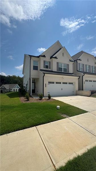 Front exterior of a new home in , Duluth, GA, highlighting curb appeal (Image 19). Front exterior of a new home in , Duluth, GA, highlighting curb appeal (Image 19).