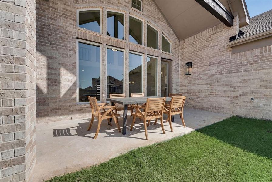 Exterior details and patio area of a home in Goodland in Prairie Ridge, Venus (Image 3).