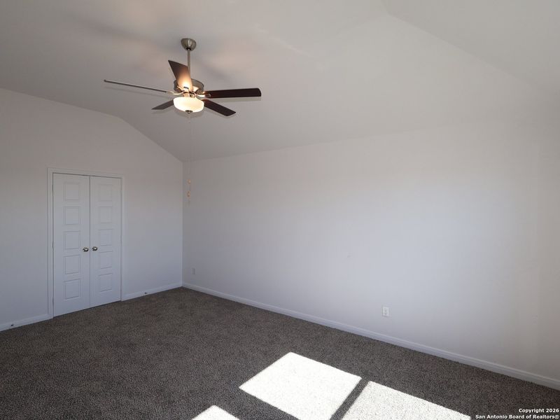 Spacious, unfurnished interior of a new home in Hunters Ranch, San Antonio (Image 24).
