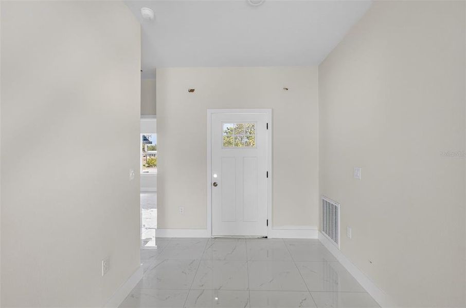 Spacious, unfurnished interior of a new home in , Port Charlotte (Image 29).