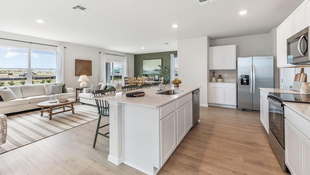 Furnished interior view inside a new home in Bella Lago, Parrish (Image 3).