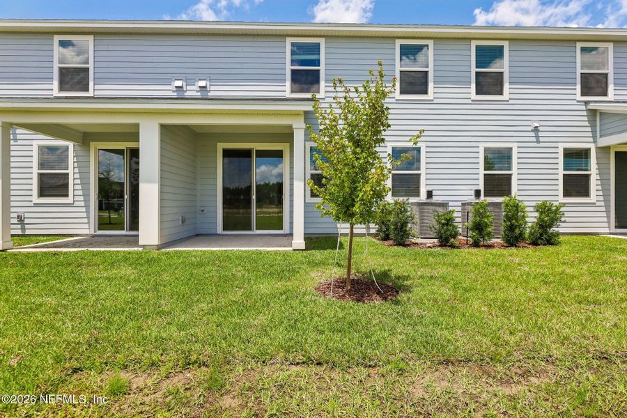 Exterior details and patio area of a home in Parkside at Shearwater, St. Augustine (Image 4).