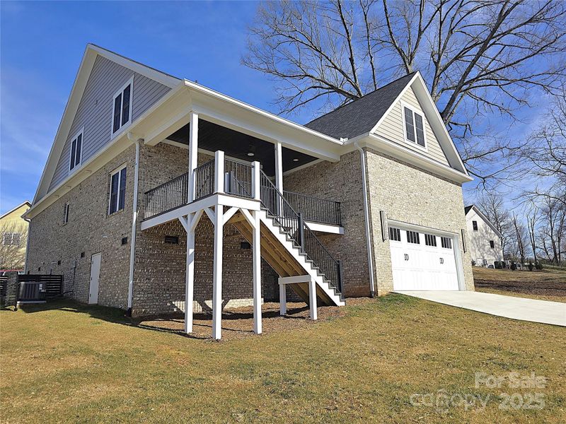Front exterior of a new home in , Hickory, NC, highlighting curb appeal (Image 22).