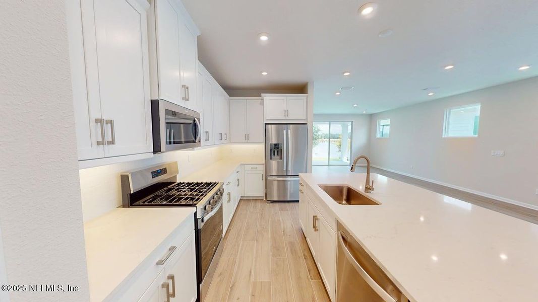 Furnished interior view inside a new home in RiverTown - WaterSong, St. Johns (Image 11). Furnished interior view inside a new home in RiverTown - WaterSong, St. Johns (Image 11).