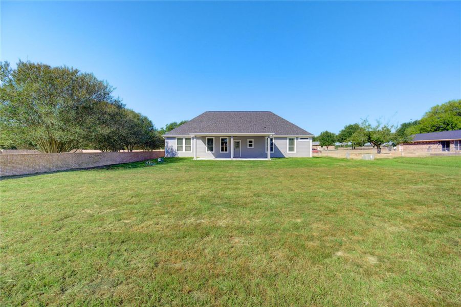 Exterior details and patio area of a home in , Waller (Image 23). Exterior details and patio area of a home in , Waller (Image 23).