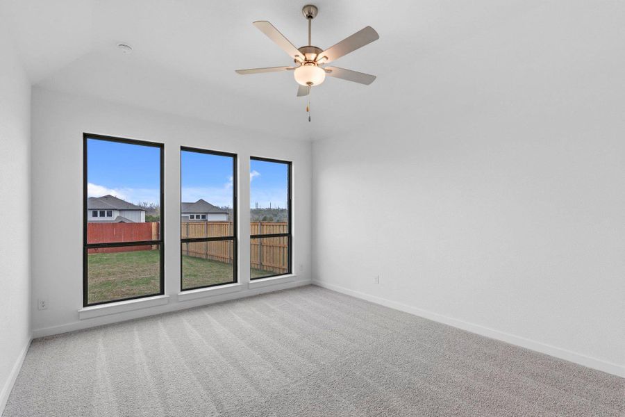 Primary Bedroom with elevated ceiling