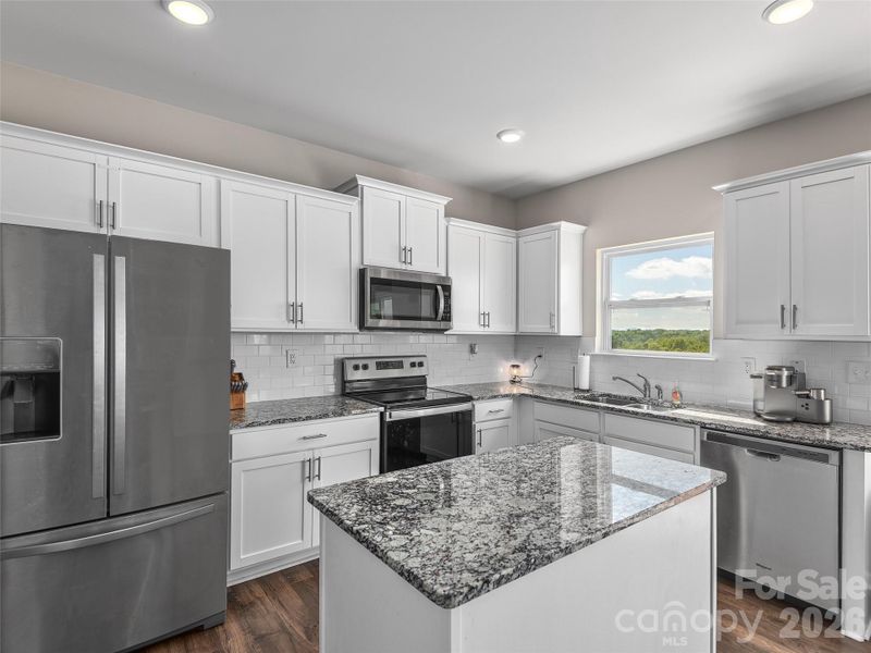 Furnished interior view inside a new home in , Candler (Image 9).