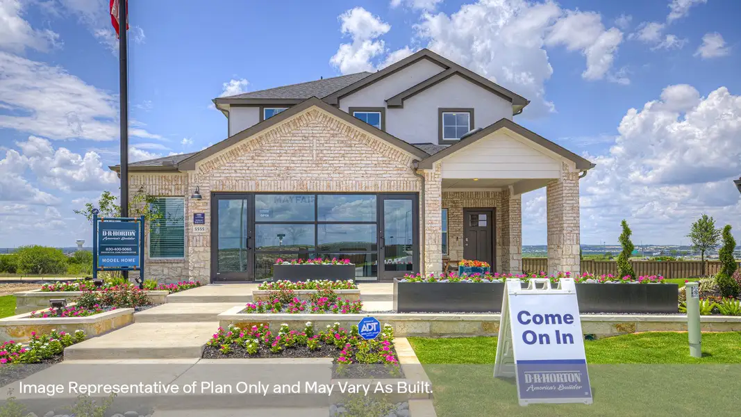 Front exterior of a new home in Mayfair, New Braunfels, TX, highlighting curb appeal (Image 1). Front exterior of a new home in Mayfair, New Braunfels, TX, highlighting curb appeal (Image 1).