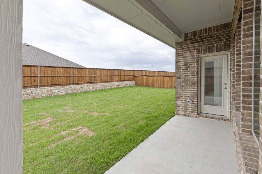 Exterior details and patio area of a home in River Ranch, Van Alstyne (Image 3). Exterior details and patio area of a home in River Ranch, Van Alstyne (Image 3).