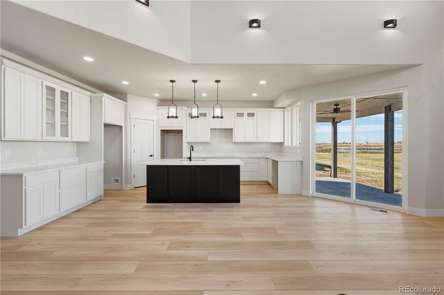 from stairs towards kitchen