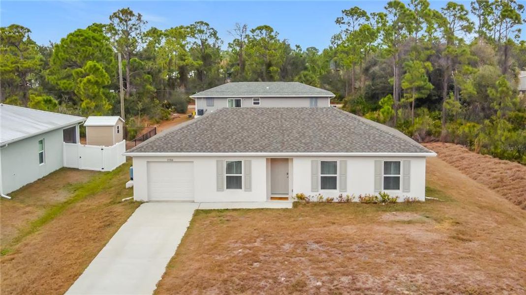 Exterior details and patio area of a home in , Port Charlotte (Image 24).