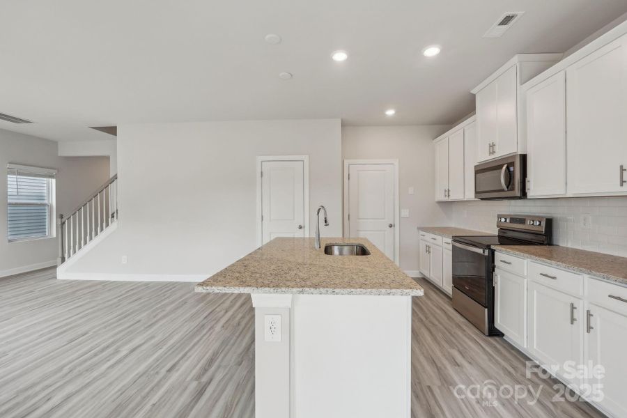 Furnished interior view inside a new home in Walnut Reserve, Conover (Image 5).