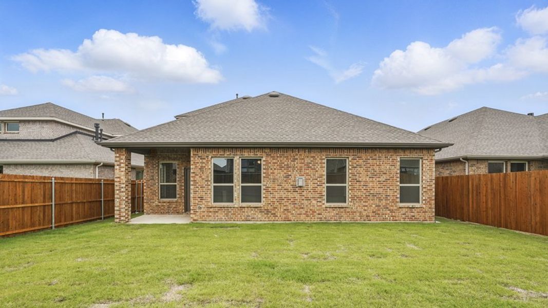Representative exterior photo of a completed home built from the Ivery by D.R. Horton in Madera, Royse City, TX (Image 22).