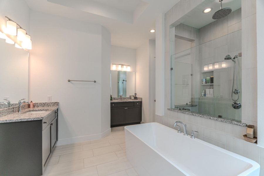 Master Bath With His & Hers, Large Mirrors, Quartz Countertops & More. Master Bath Is Spacious, Offers Excellent Lighting, Large Walk In Shower And Large Soak In Tub.