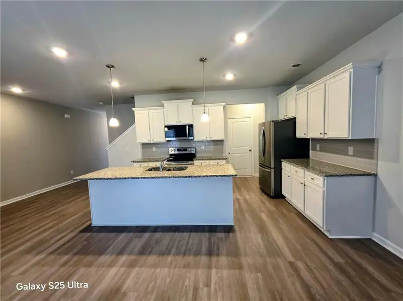 Furnished interior view inside a new home in , Grayson (Image 3).