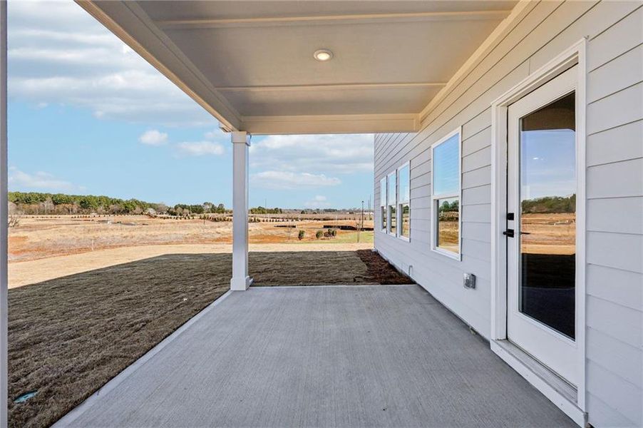 Exterior details and patio area of a home in River Pointe, Monroe (Image 3).