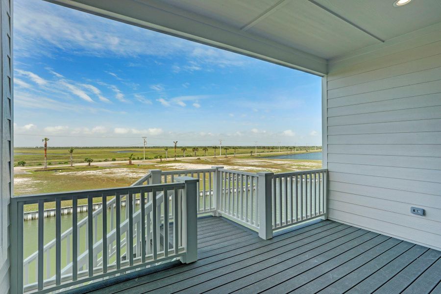 Welcoming entry porch with room for lounge seating and made of Trex decking. Welcoming entry porch with room for lounge seating and made of Trex decking.
