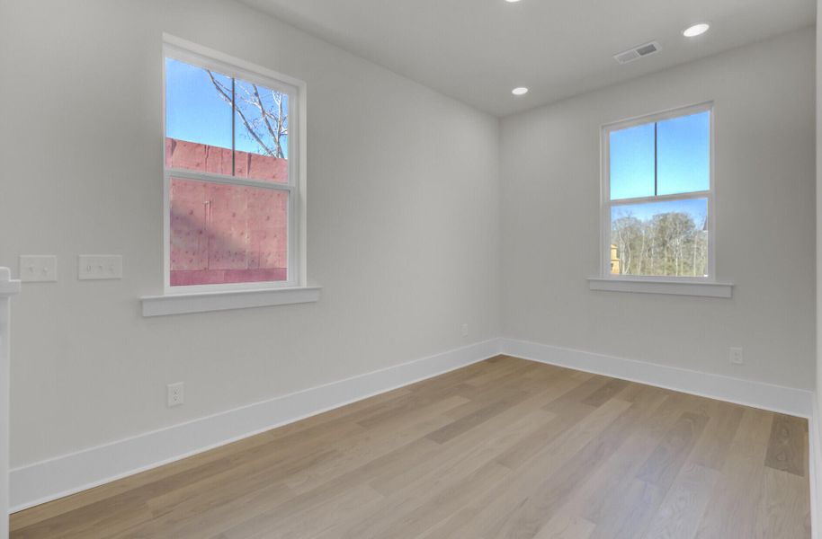 Spacious, unfurnished interior of a new home in Indigo Grove Single Family Homes, Johns Island (Image 24). Spacious, unfurnished interior of a new home in Indigo Grove Single Family Homes, Johns Island (Image 24).