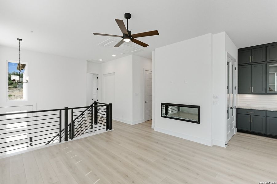 Spacious, unfurnished interior of a new home in Centero at Stone Oak, San Antonio (Image 22).