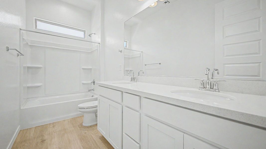 Furnished interior view inside a new home in Windrose, Waddell (Image 26).