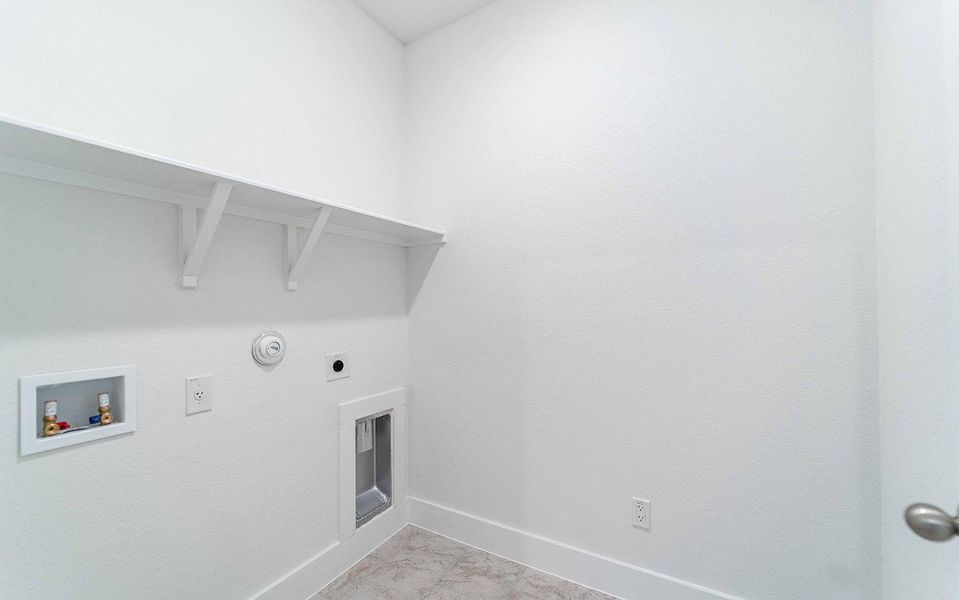 Laundry room featuring hookup for a washing machine, electric dryer hookup, and hookup for a gas dryer