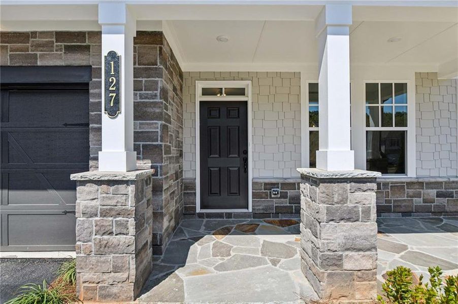 Exterior details and patio area of a home in Creekside, Dawsonville (Image 27).