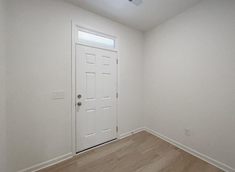 Spacious, unfurnished interior of a new home in East Main Townes, Spartanburg (Image 11).