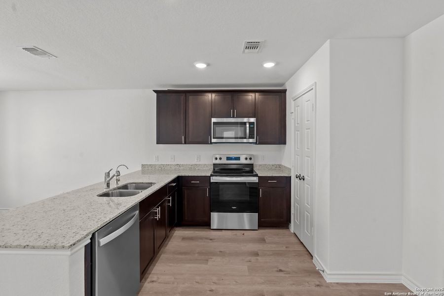 Furnished interior view inside a new home in Vista Real, Converse (Image 8).
