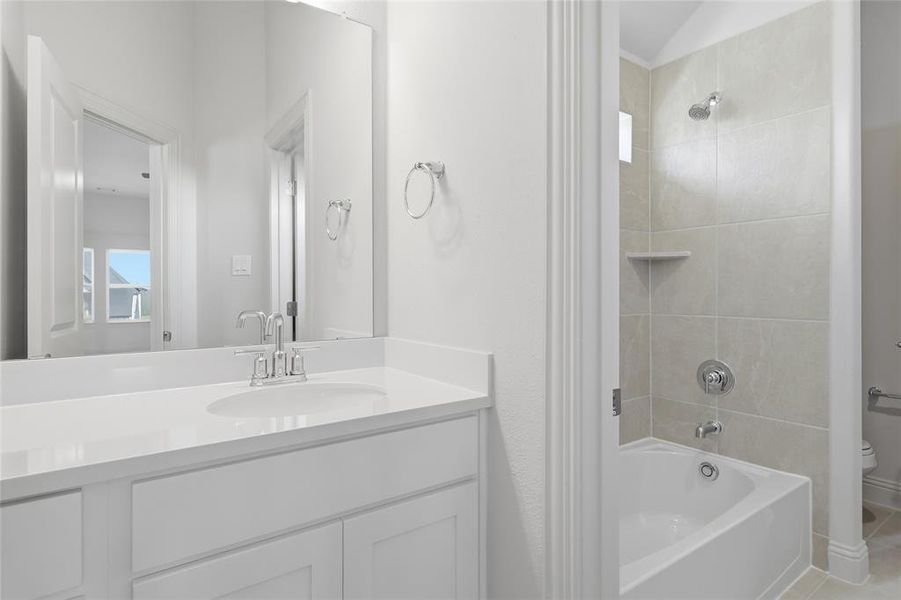 Full bathroom featuring shower / washtub combination and vanity
