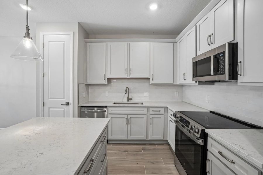The kitchen features our beautiful AW Collection® Milan