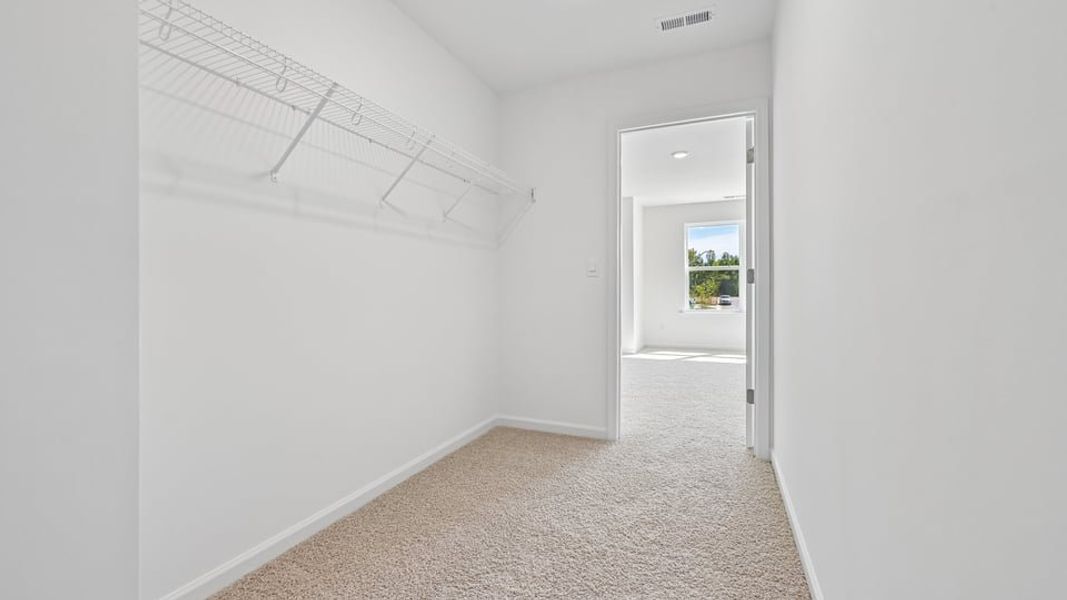 Spacious, unfurnished interior of a new home in The Townes at Belle Grove, Wendell (Image 13).