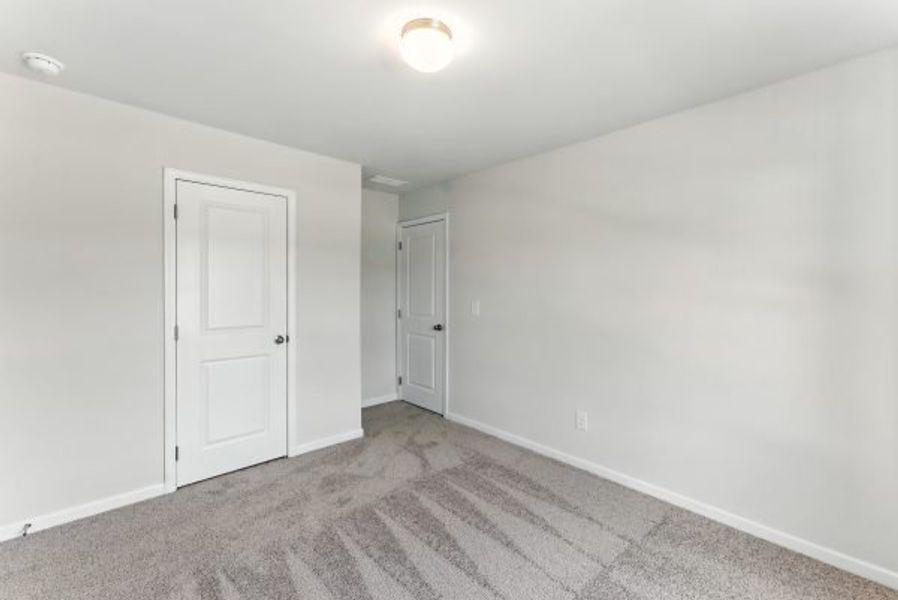 Representative unfurnished interior of a home built from the Brentwood by Piedmont Residential in Falls Creek, Flowery Branch (Image 33).