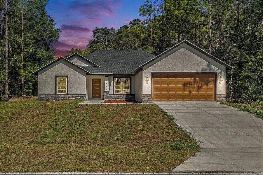 Front exterior of a new home in , Citrus Springs, FL, highlighting curb appeal (Image 18).