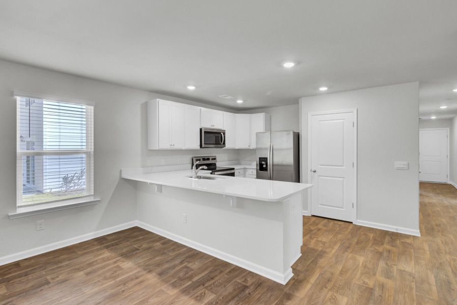 Furnished interior view inside a new home in Center Pointe, Santee (Image 7). Furnished interior view inside a new home in Center Pointe, Santee (Image 7).