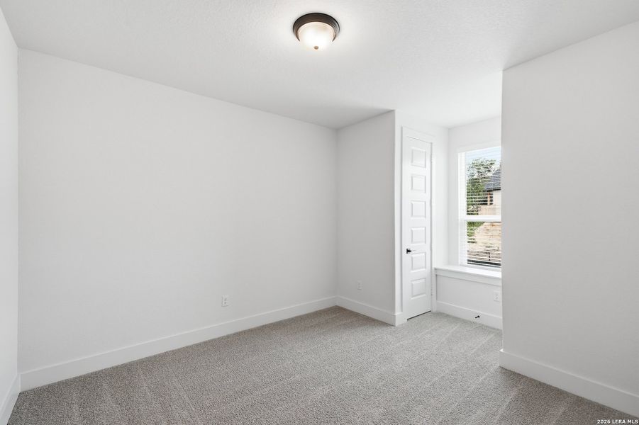 Spacious, unfurnished interior of a new home in The Reserve at Potranco Oaks, Castroville (Image 22).