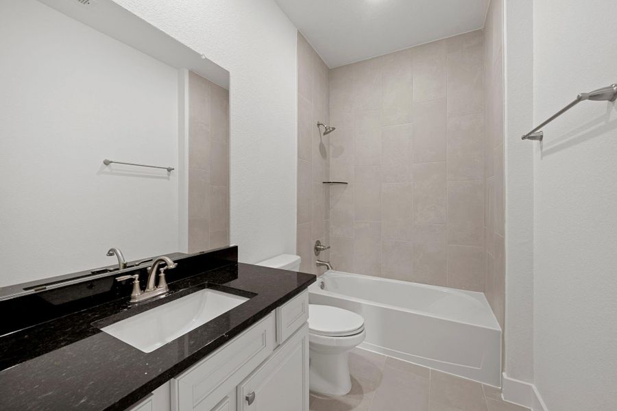 Furnished interior view inside a new home in Bridgeland, Cypress (Image 8).