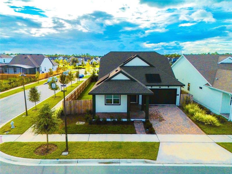 Front exterior of a home in the Weslyn Park at Sunbridge (Craft Homes) community, located in St. Cloud, FL (Image 14).